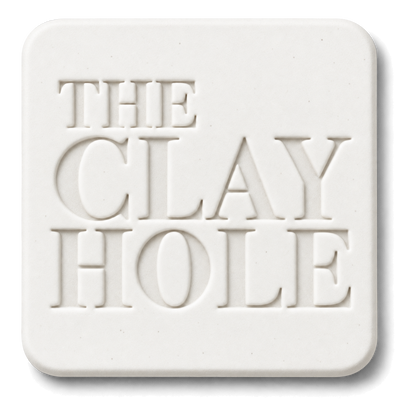 White Laguna #16 Porcelain cone 6 clay tile, unglazed, stamped with The Clay Hole logo