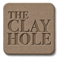 Tan Laguna 52 Buff clay tile, unglazed, stamped with The Clay Hole logo