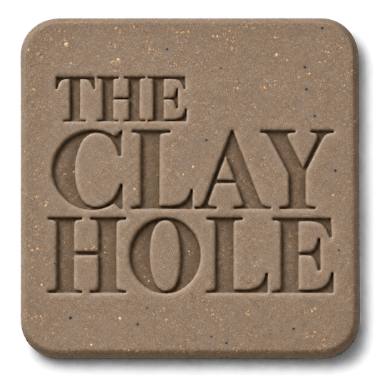 Tan Laguna 52 Buff clay tile, unglazed, stamped with The Clay Hole logo