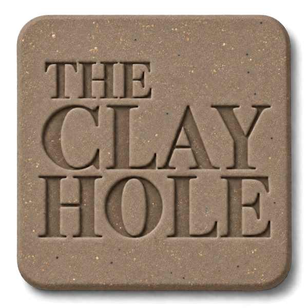 Tan Laguna 52 Buff clay tile, unglazed, stamped with The Clay Hole logo