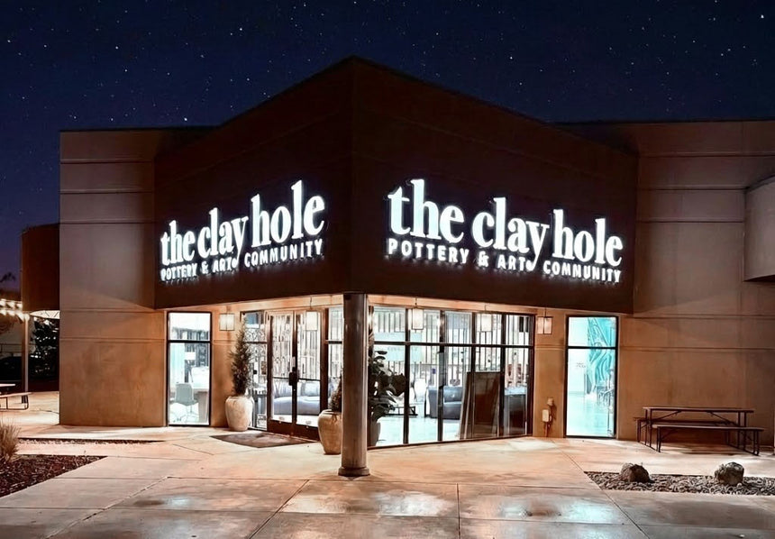 Inside The Clay Hole, a nearly 10,000 square foot pottery studio in Draper, Utah, with worktables, wheels and shelves of member pottery