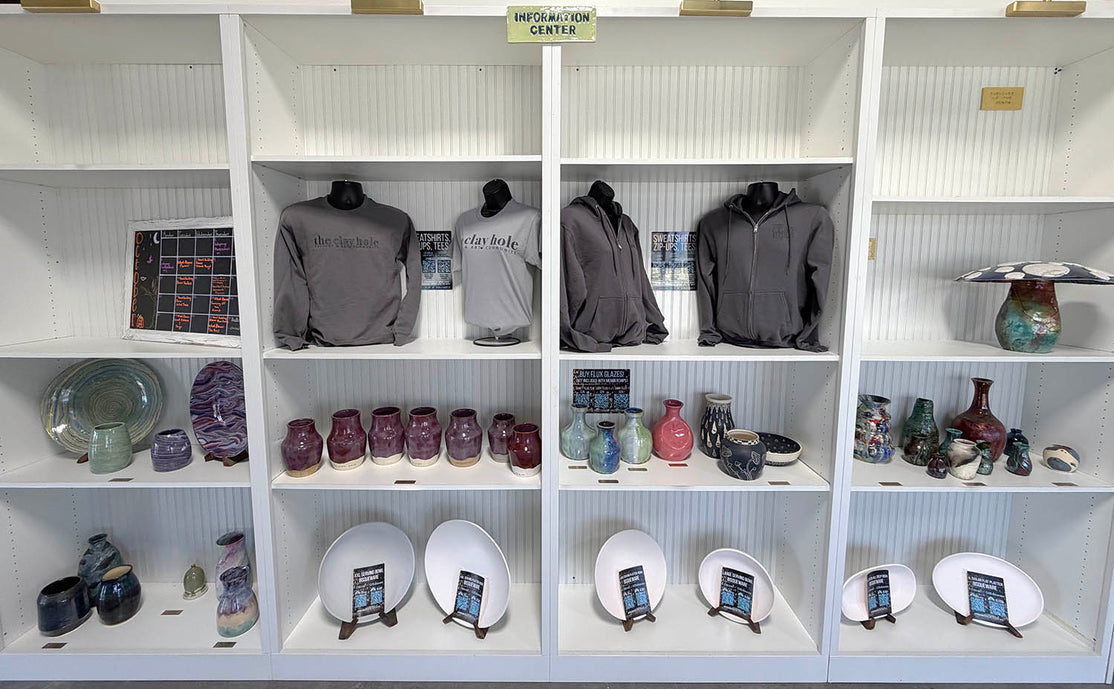 The Information Center display area with clay and glaze information and studio merchandise.