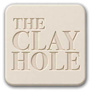 Cream Laguna B-Mix clay tile, unglazed, stamped with The Clay Hole logo