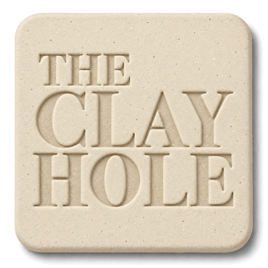 Off-white Laguna B-Mix with Grog clay tile, unglazed, stamped with The Clay Hole logo