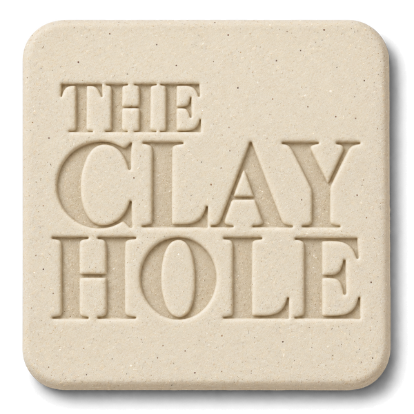Off-white Laguna B-Mix with Grog clay tile, unglazed, stamped with The Clay Hole logo