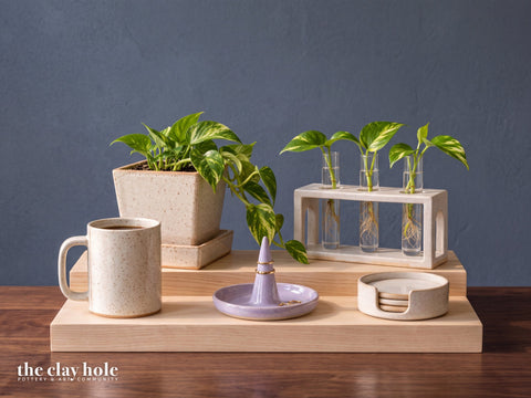 Pottery made from the Beginner paper templates from The Clay Hole, grouped on a wooden stand