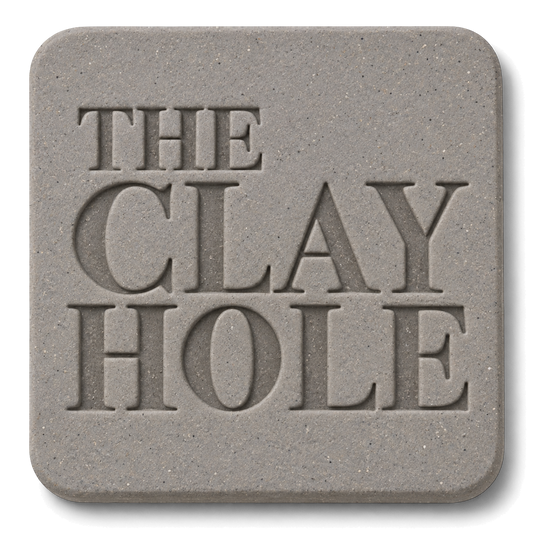 Sio-2 Berlin Gray clay tile, unglazed, stamped with The Clay Hole logo