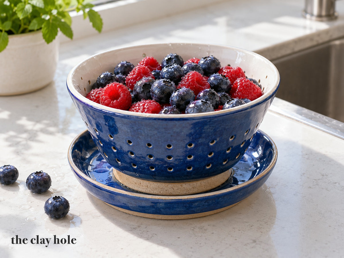 A Berry Colander and Saucer made from The Clay Hole paper template 35: a footed berry colander with every drain hole printed on the pattern, and a saucer for the drips