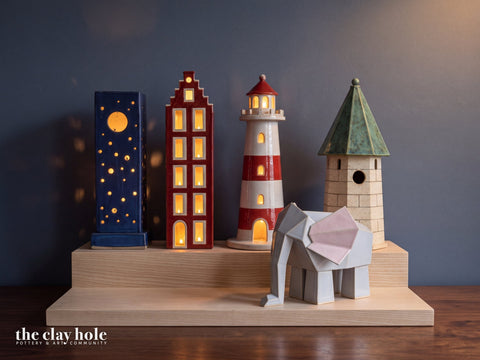 Pottery made from the Expert paper templates from The Clay Hole, grouped on a wooden stand