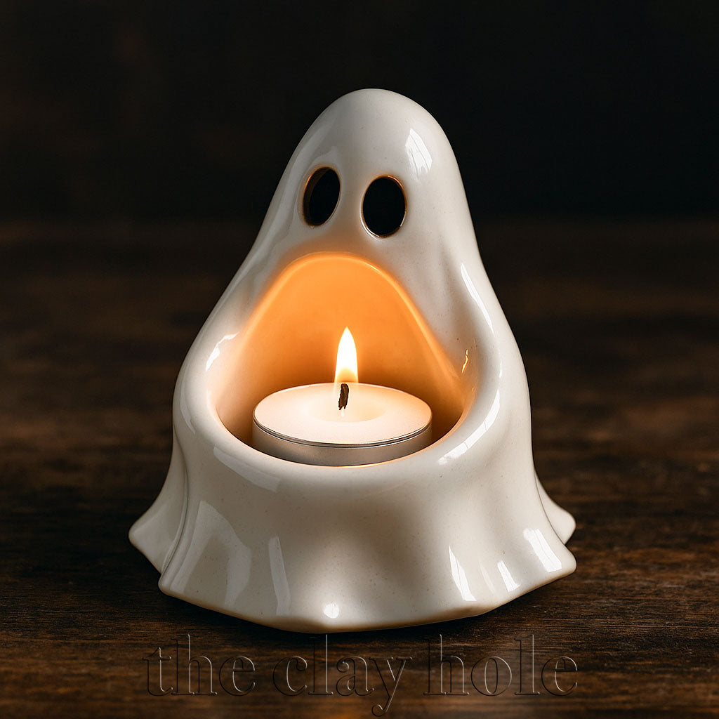 A Halloween Candle Holder made in a pottery and ceramic class