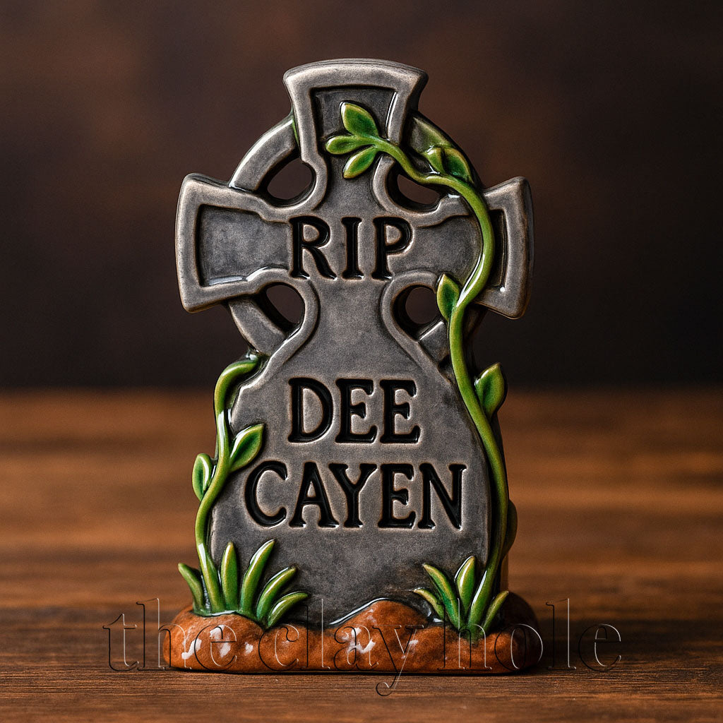 A ceramic tombstone made in a pottery and ceramic class