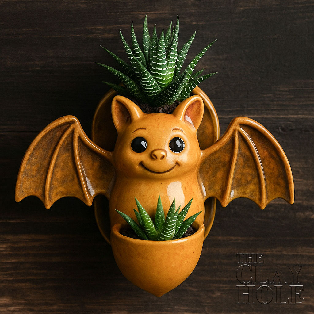 A hanging bat planter made in a pottery and ceramic class