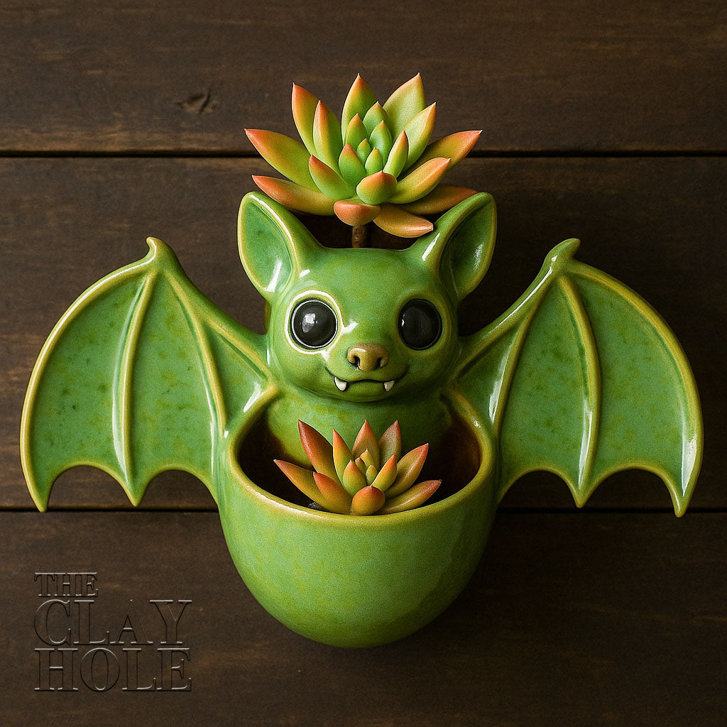 A hanging bat planter made in a pottery and ceramic class
