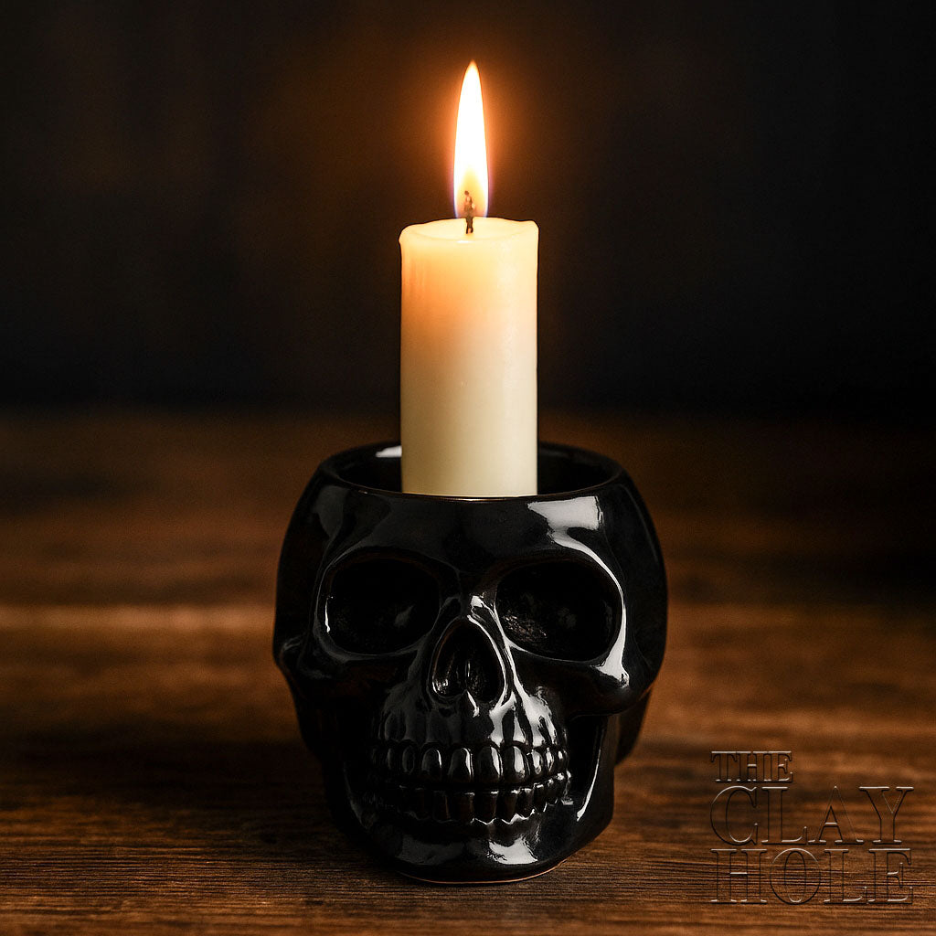 A Halloween Candle Holder made in a pottery and ceramic class