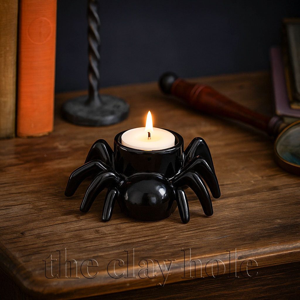 A Halloween Candle Holder made in a pottery and ceramic class