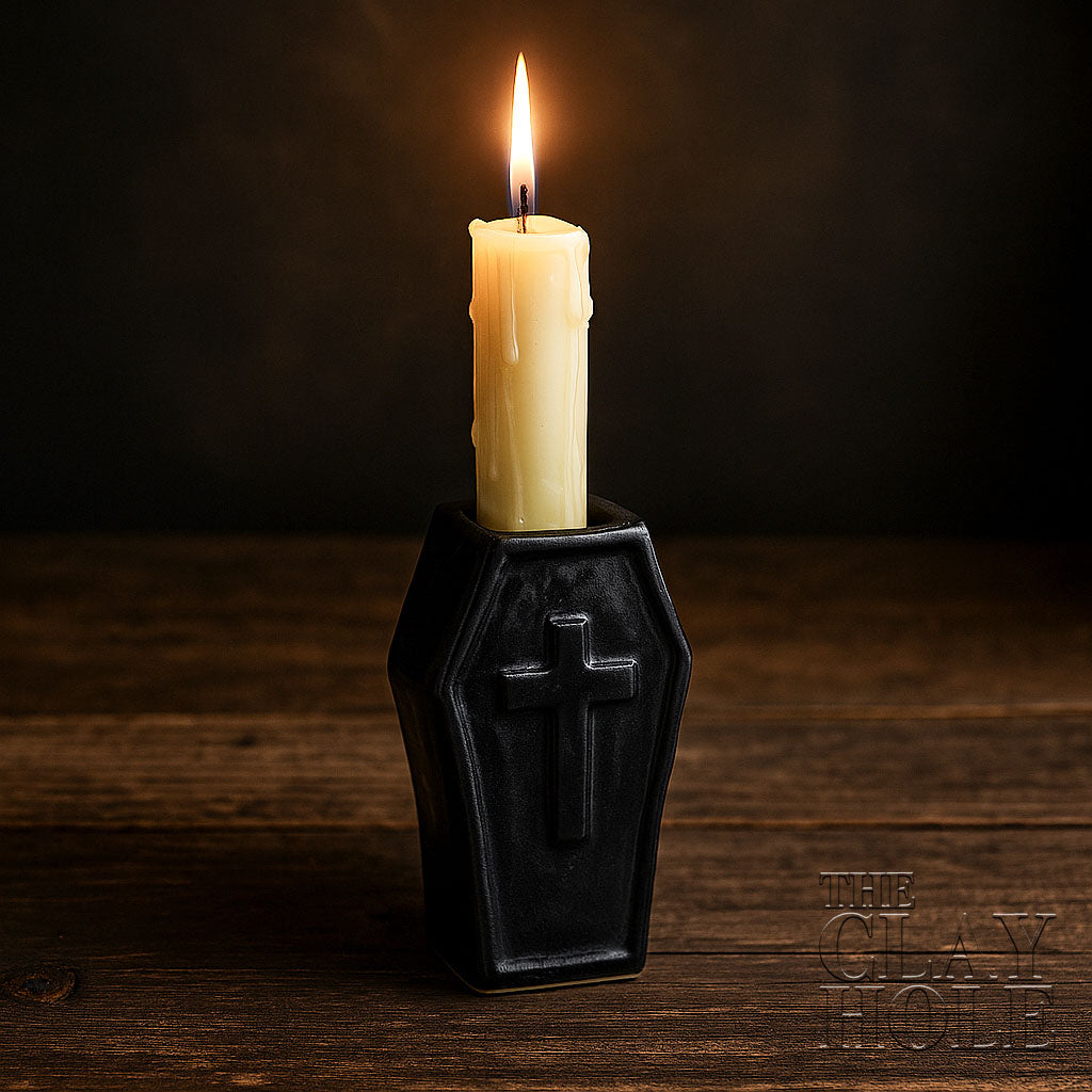 A Halloween Candle Holder made in a pottery and ceramic class