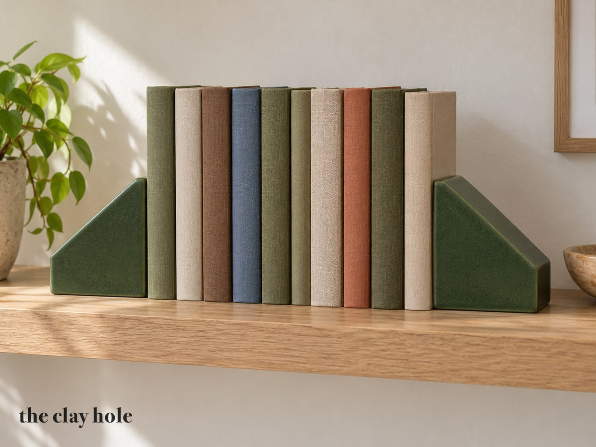 A Hollow Bookends made from The Clay Hole paper template 34: a pair of hollow ramp-shaped bookends, filled with sand after firing