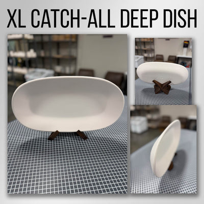 An oblong bisque-fired stoneware catch-all deep dish shown front on and from the side
