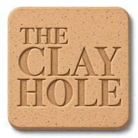 Tan Laguna Speckled Buff clay tile, unglazed, stamped with The Clay Hole logo
